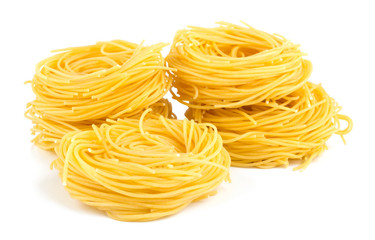 Italian egg pasta nest isolated on white background