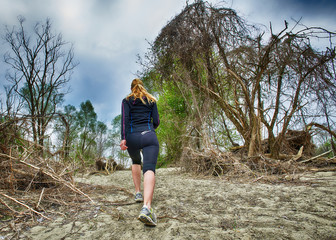 Walking and running in the wild sandy forest