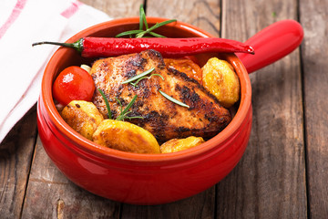 oven baked chicken fillet with potatoes - obrazy, fototapety, plakaty