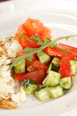 Scrambled eggs with salmon and vegetables