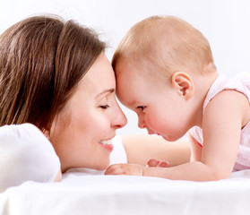 Mother and Baby kissing and hugging. Happy Family