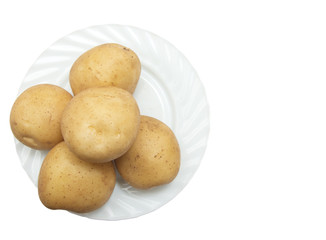 fresh potatoes on the plate on white background