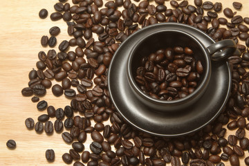 coffee bean in black coffee cup