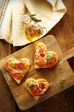 Cute heart shaped mini pizzas