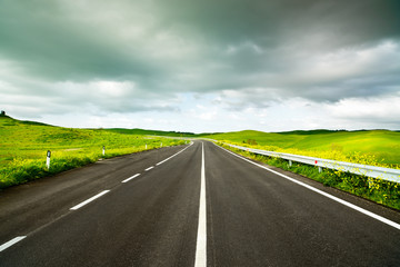 Tuscany, road in Rural Landscape near Volterra in spring, Italy.