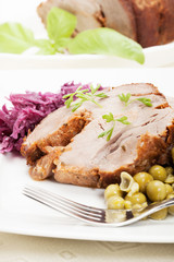 Roast pork with sauce. Selective focus.
