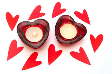 heart shaped candles on a white background