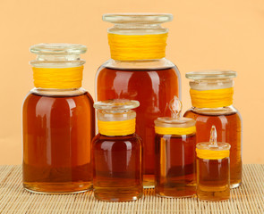 Medicine bottles on beige background