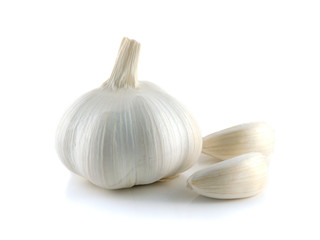 Isolated garlic with cloves on a white background.