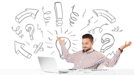 Young businessman brainstorming with drawn arrows and symbols