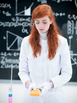 student scanning in chemistry lab