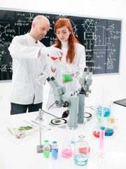 people working in a chemistry lab