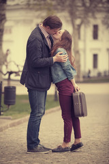 Young couple kissing on the street