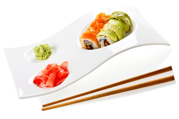 sushi on ceramic plate isolated on white