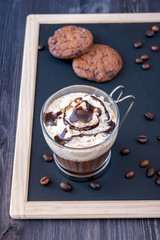 Coffee with whipped cream and chocolate chip cookies  