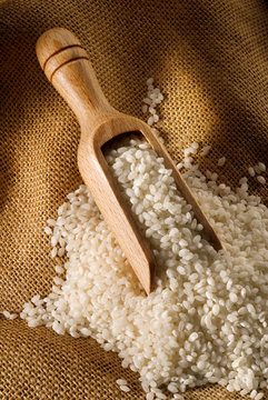 rice with wooden spoon
