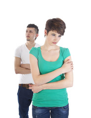 Young man and woman arguing isolated on white background