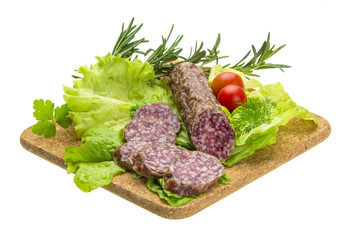 Salami with rosemary, salad and tomatoes