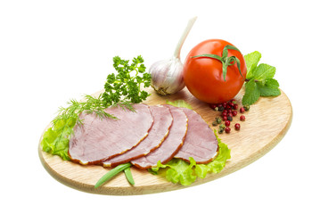 Ripe fresh ham with vegetables