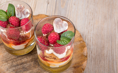 Fresh raspberry dessert with biscuit