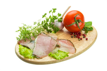 Ripe fresh ham with vegetables