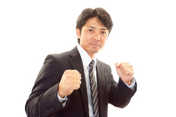 ガッツポーズのビジネスマン