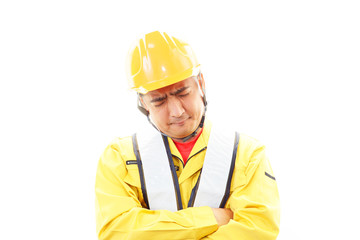 疲れた表情の作業員