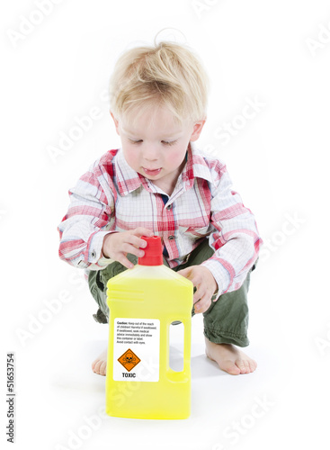 Child playing with toxic cleaner