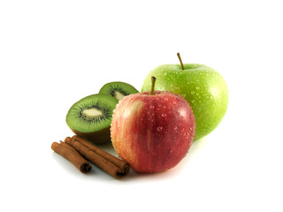 Isolated green and red apples, kiwi with cinnamon
