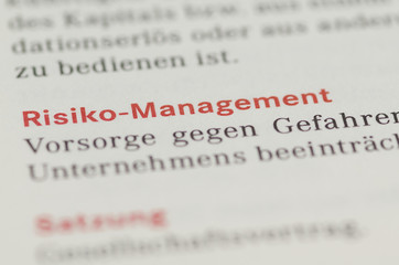 Risiko-Management Überschrift und Definition in einem Buch