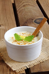 Rice pudding in a white ramekin