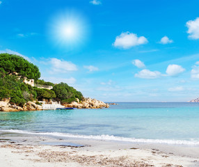 white sand and blue water