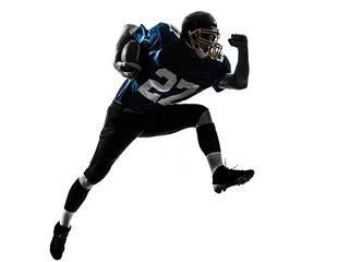 Fotobehang american football player man running  silhouette © snaptitude