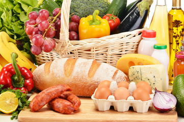 Assorted grocery products including vegetables fruits wine bread