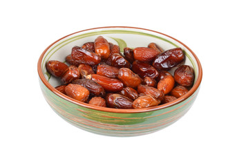 Delicious dried date fruit in bowl, isolated on white