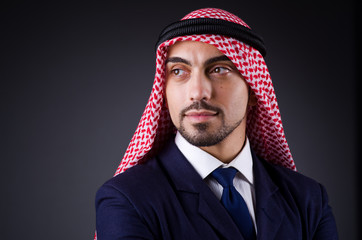 Fototapeta premium Arab businessman in dark studio