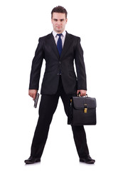 Businessman with gun isolated on white