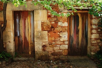 Two colorful painted doors, Roussillon village, Provence, France