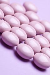 vitamin pills isolated on pastel background 