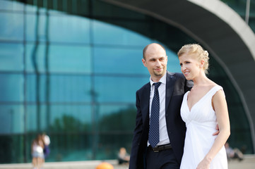 Bride and groom walking together