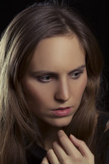 Serious and Wondering Young Woman Portrait