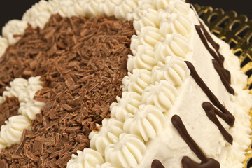 Close up of a cream and chocolate cake