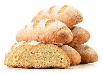 Composition with loafs of bread isolated on white background