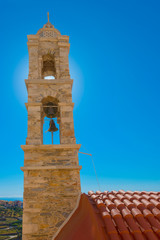 Greece Siros, traditional church view in chora with sun from beh © korpithas