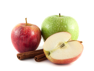 Isolated wet green and red apple with sliced half