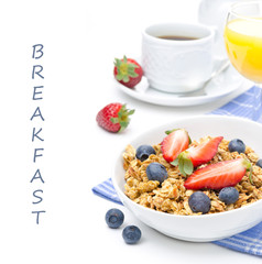 breakfast with homemade granola and fresh berries, orange juice