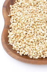 green buckwheat sprouts in a wooden bowl
