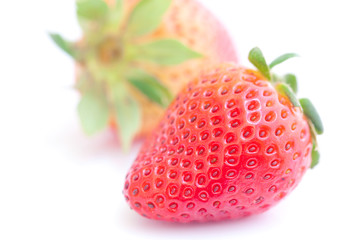 big red strawberry isolated on white