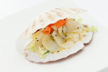 scallops served in a shell