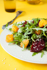 fresh salad with arugula and orange